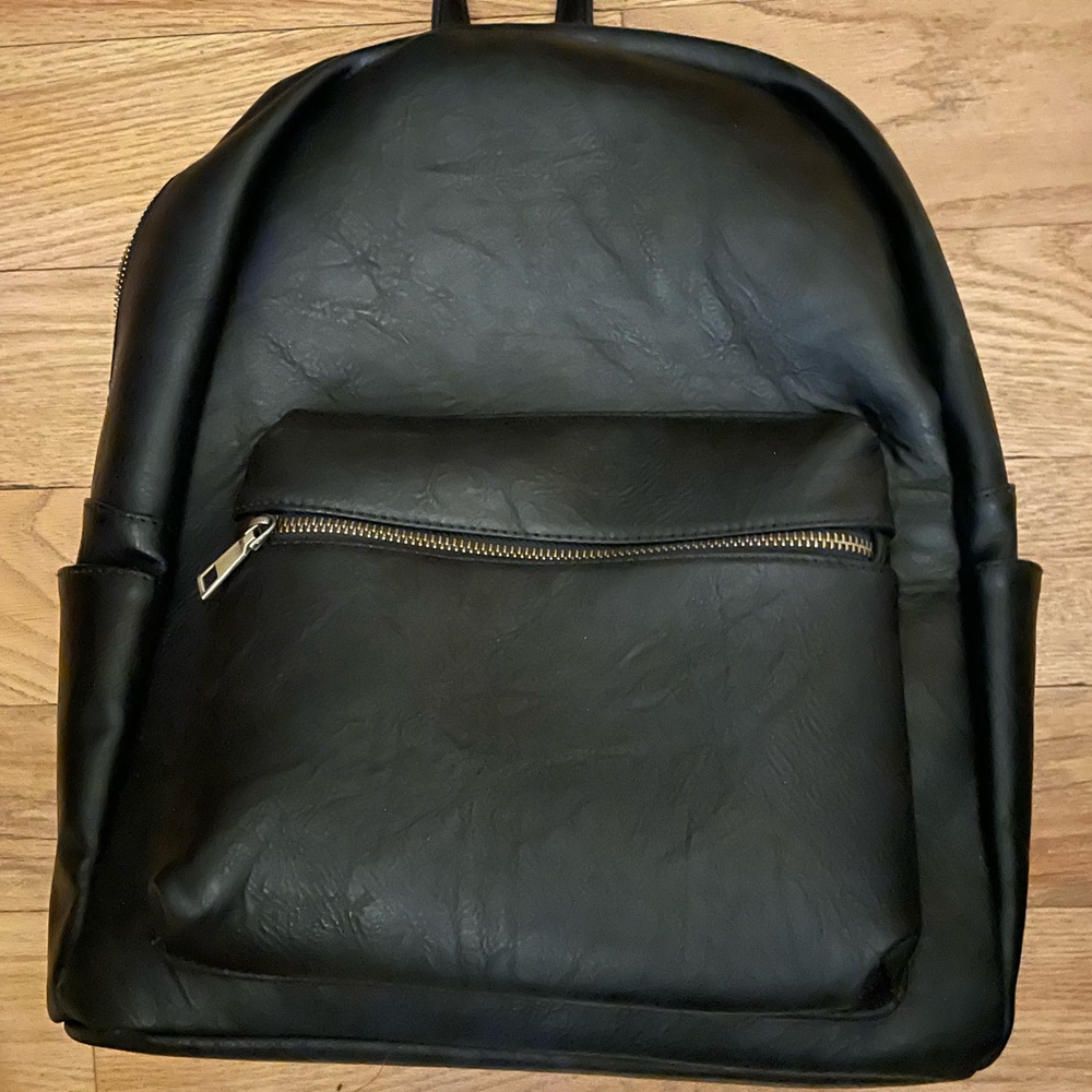 Genuine black leather backpack brand new